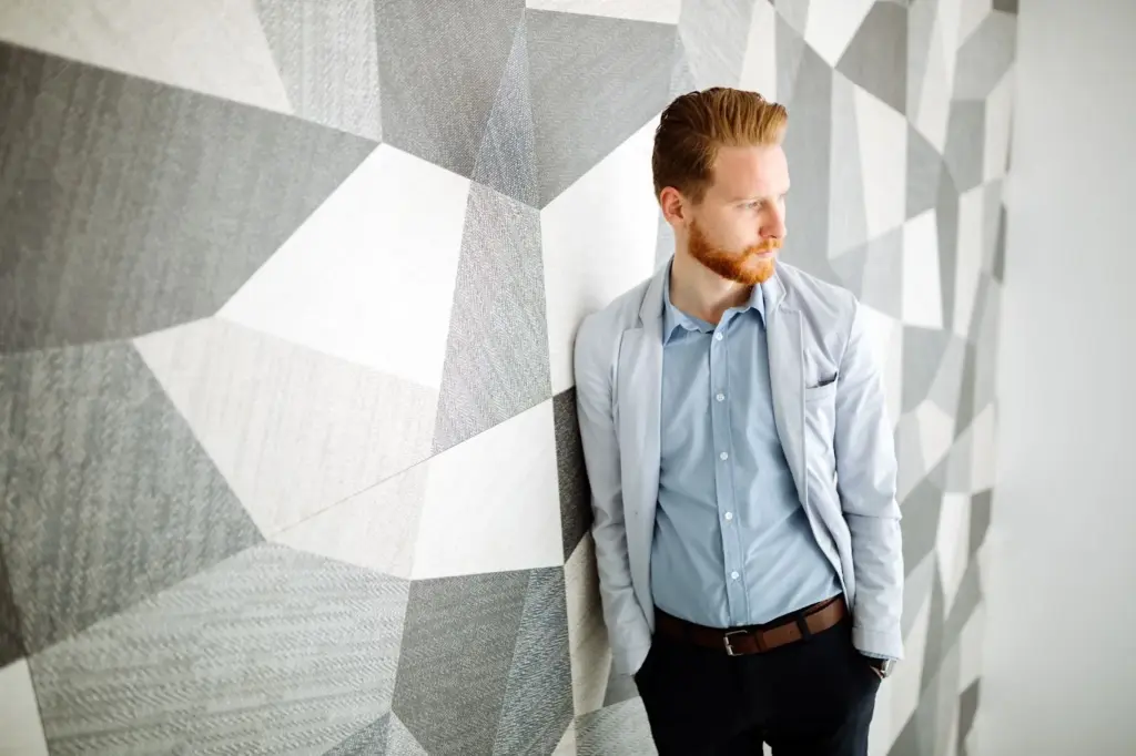 Leaning on a patterned wall