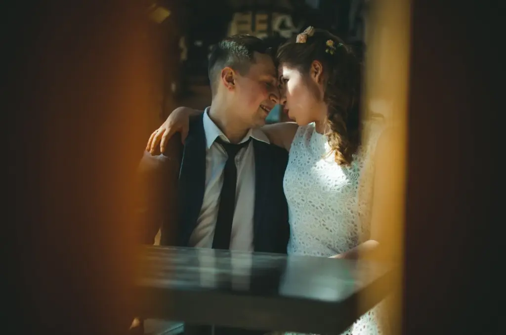 Looking at each other through an old wooden door