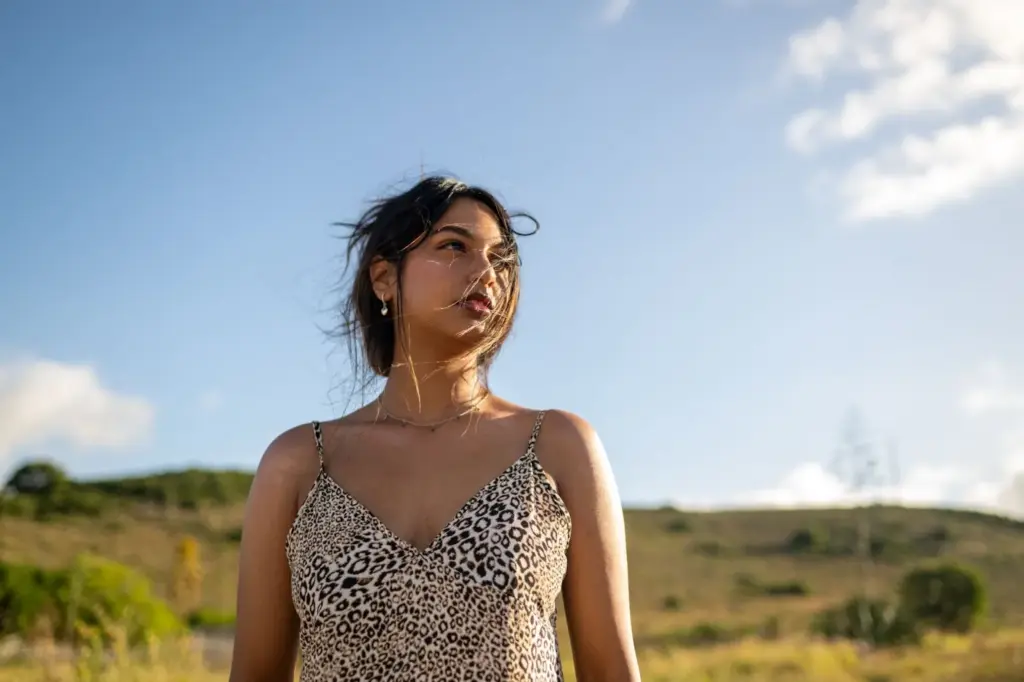 Looking at the sky with a warm glow on the face