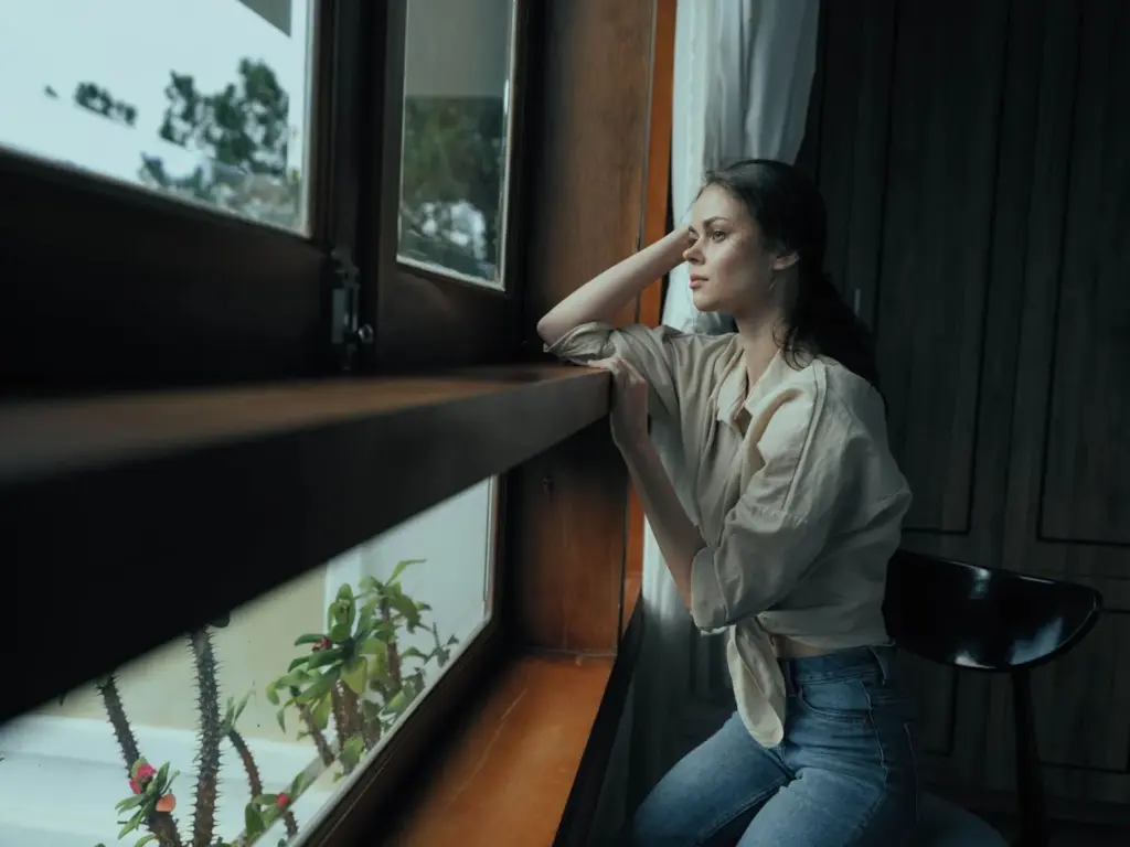 Looking out a window carefully