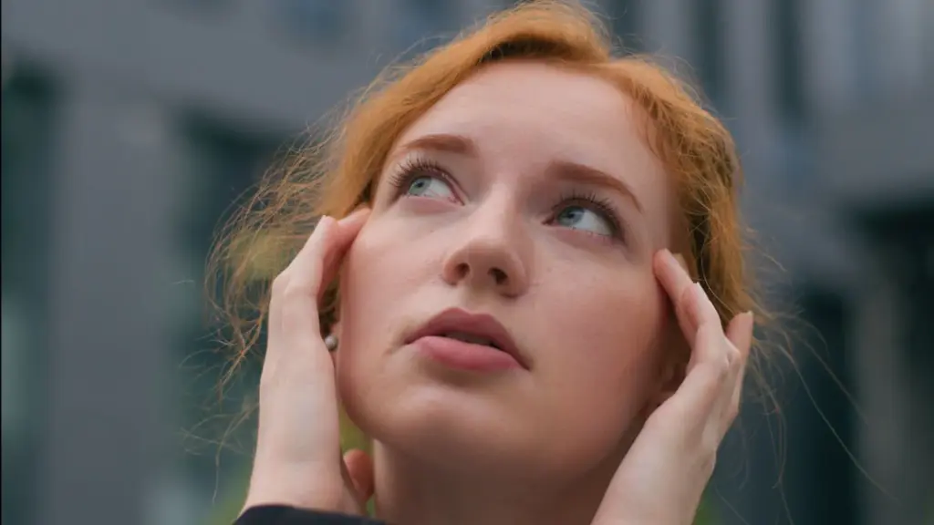 Looking up with a hopeful expression