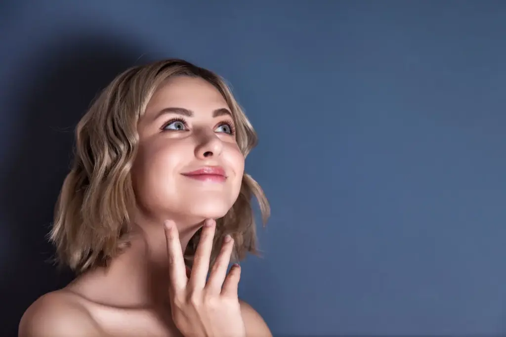 Looking upward with a soft expression