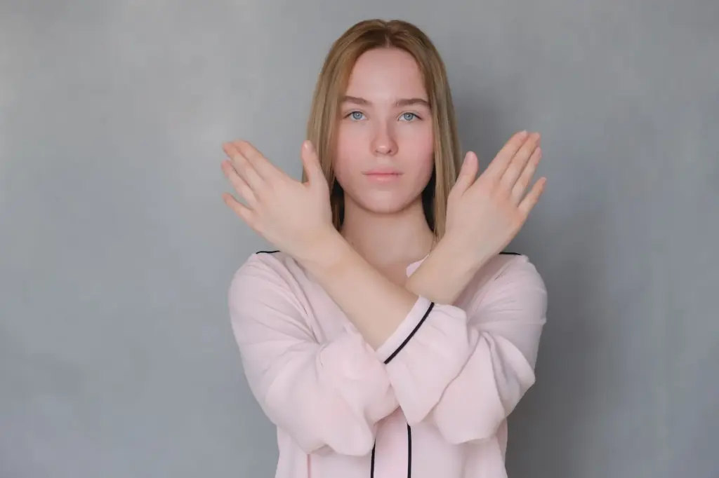 Powerful eye contact with crisscross arms