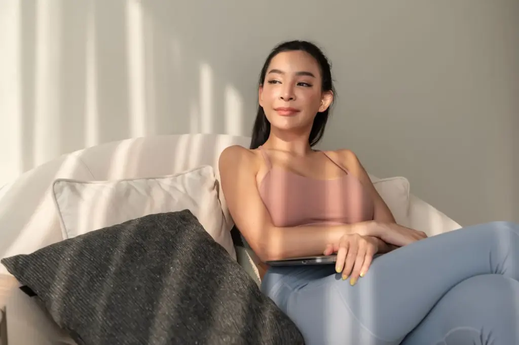 Relaxed expression with arms in lap