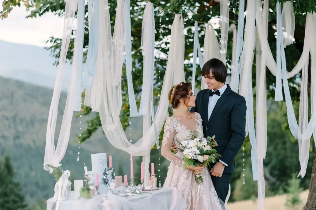 Romantic gazes under a decorated canopy