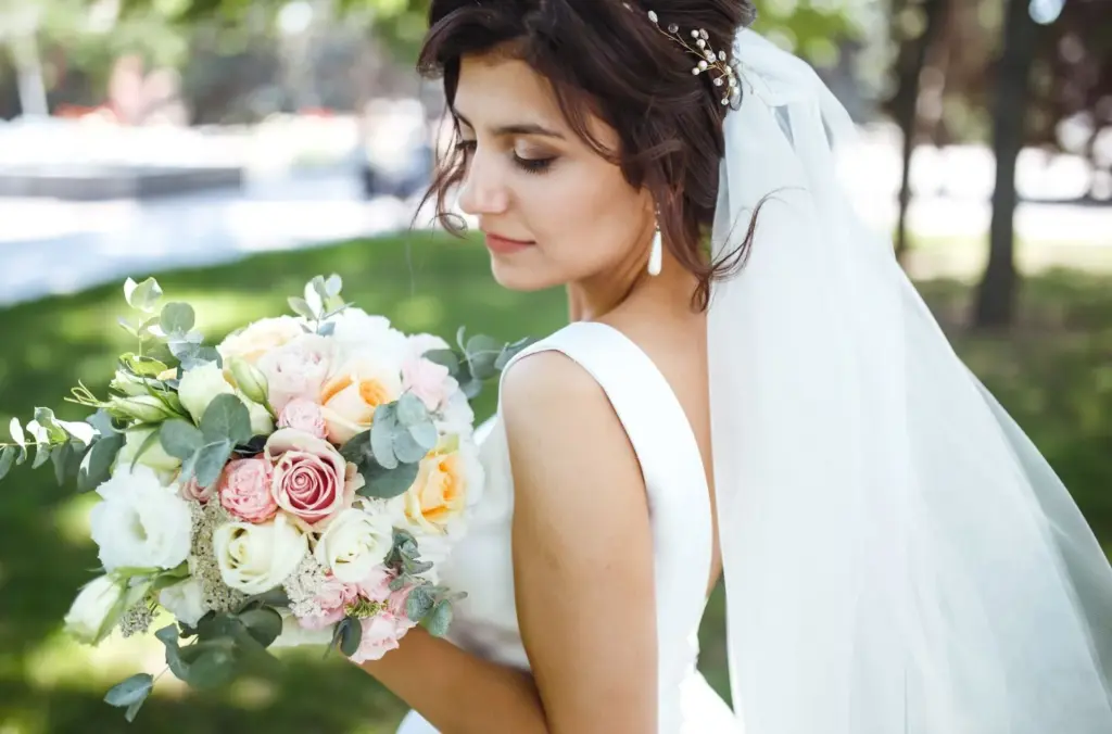 Side profile with flowers in a veil