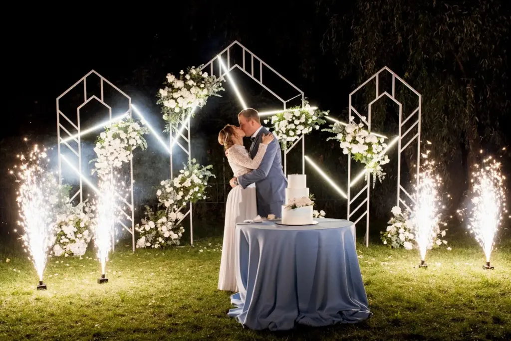 Silhouette kiss with fairy lights in the background