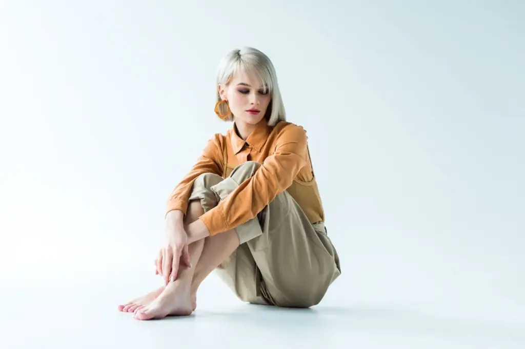 Sitting calmly with crossed legs