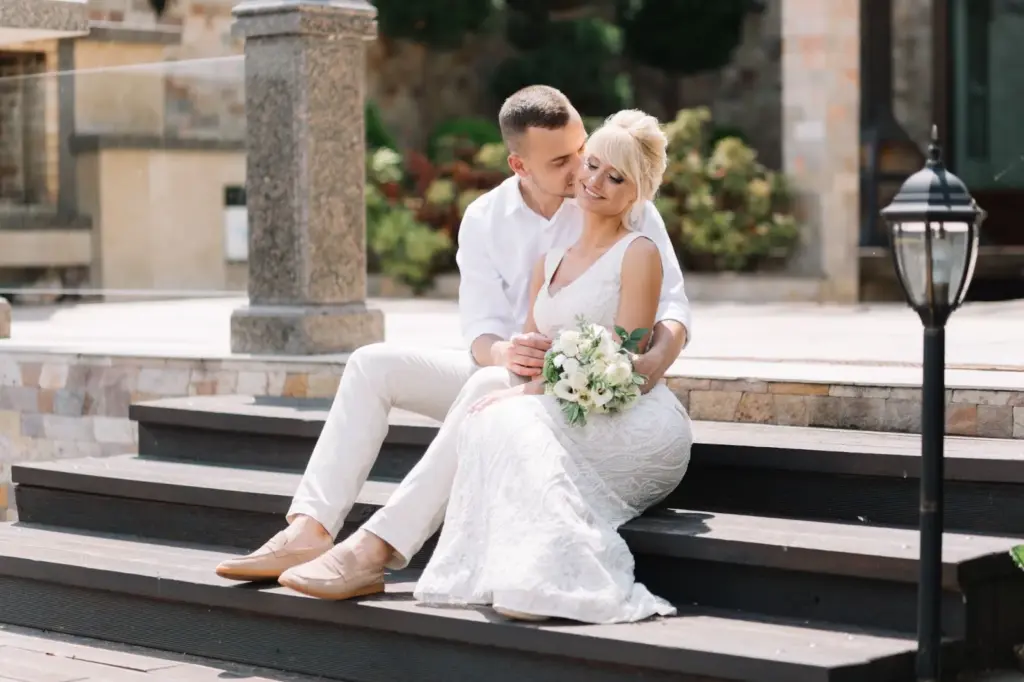 Sitting on the marble steps of a monument