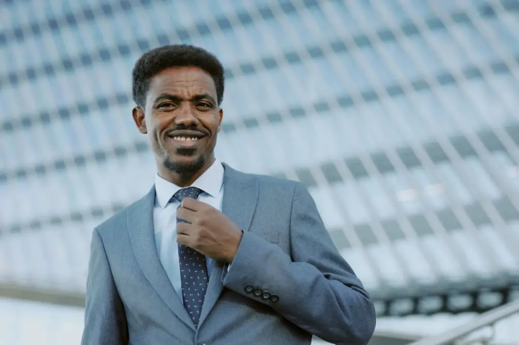 Smile with a Blazer and a tie on