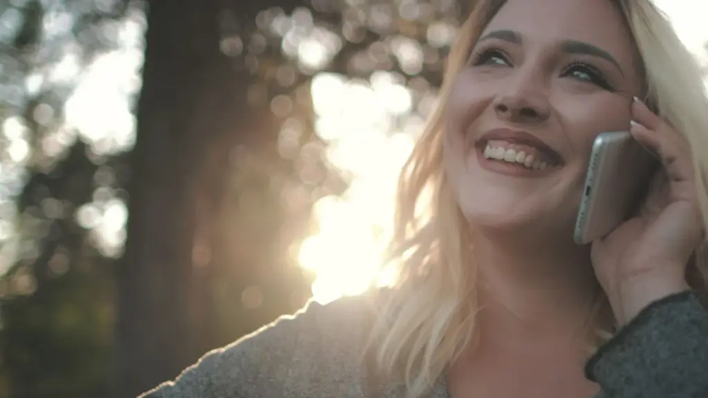 Smiling while light enters from the side