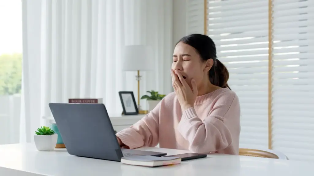 Soft expressions with laptop on desk