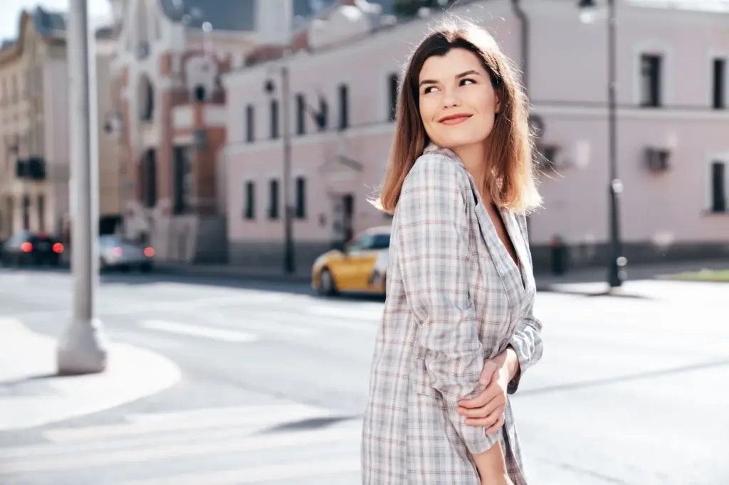 Standing on the street and looking away