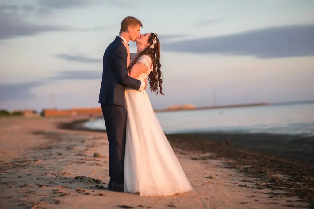 Sunset kiss on the beachside