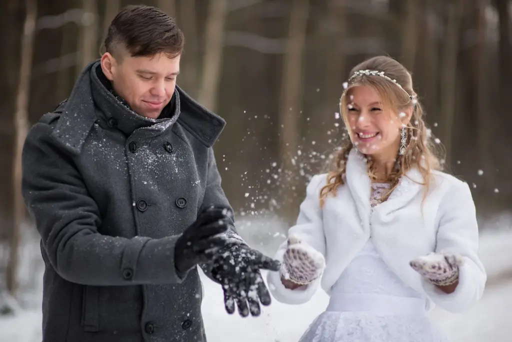Throwing snow in the air with laughter