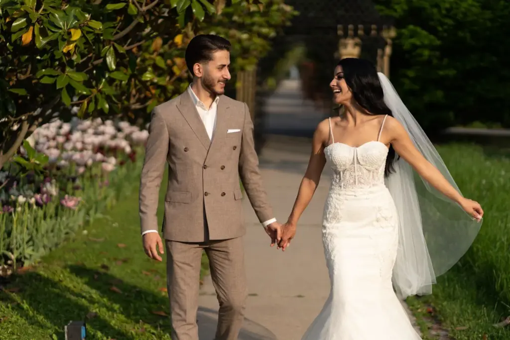 Walking hand in hand pose in soft light