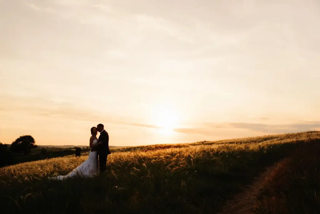 Wide shot in open fields at sunset