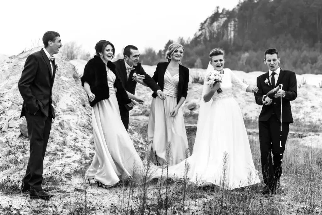 20+ Creative Group Wedding Photo Ideas for Family and Friends 97 Fun Black & White Outdoor Portrait of the Wedding Squad