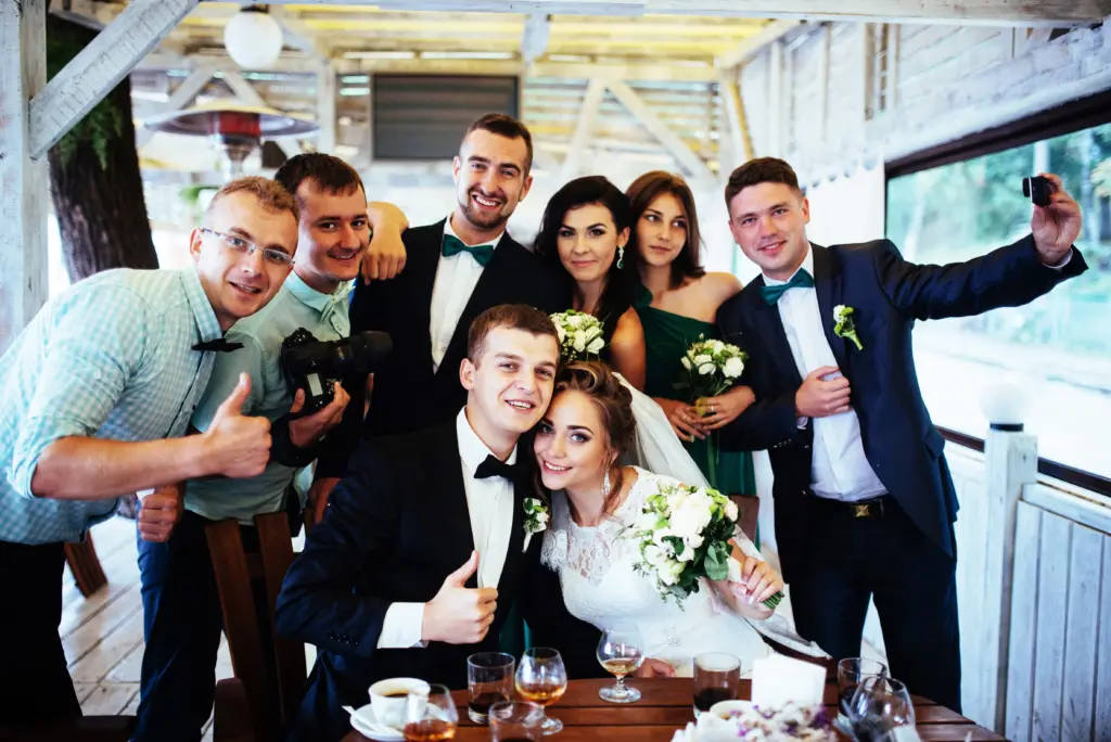 20+ Creative Group Wedding Photo Ideas for Family and Friends 55 Brides wedding day with friends in a cafe