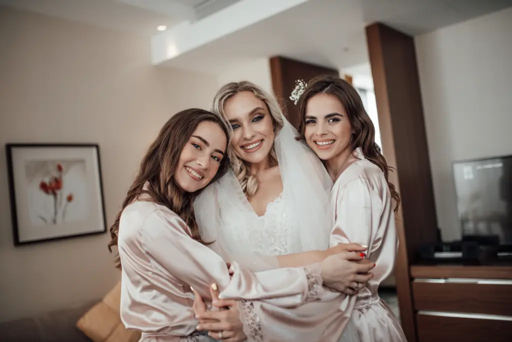 20+ Creative Group Wedding Photo Ideas for Family and Friends 15 The Bride and Her Bridesmaids Radiating Happiness